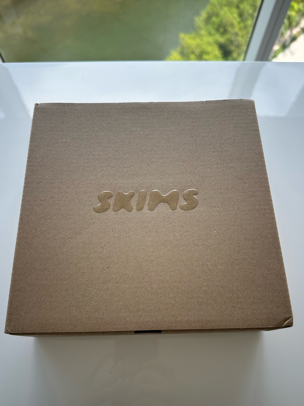 SKIMS Tan Embossed Logo Box